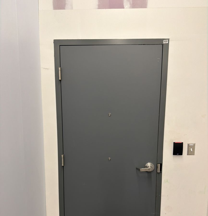 Commercial steel door closed and secured, Burlington NC