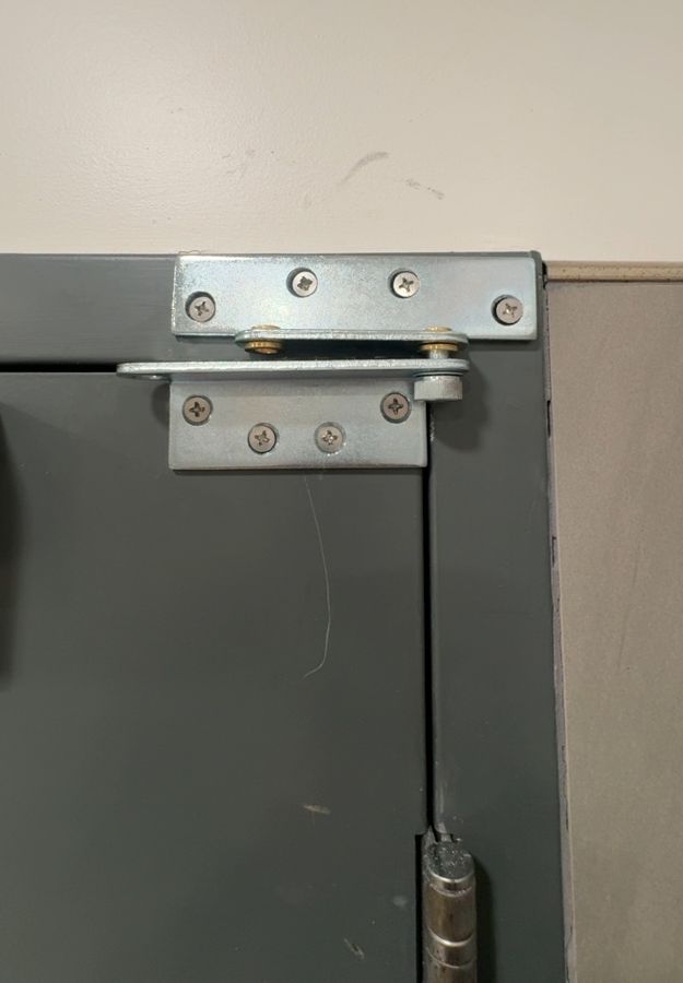 Heavy-duty pivot and closer installed, door back in service, Charlotte NC