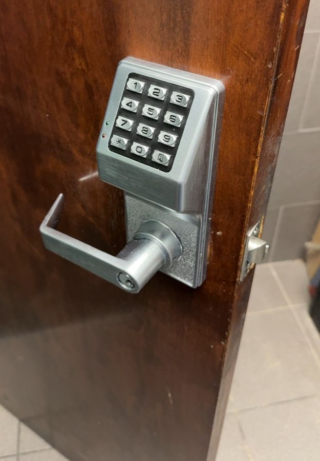 Keypad lever lock installed on the same restroom door, Charlotte NC