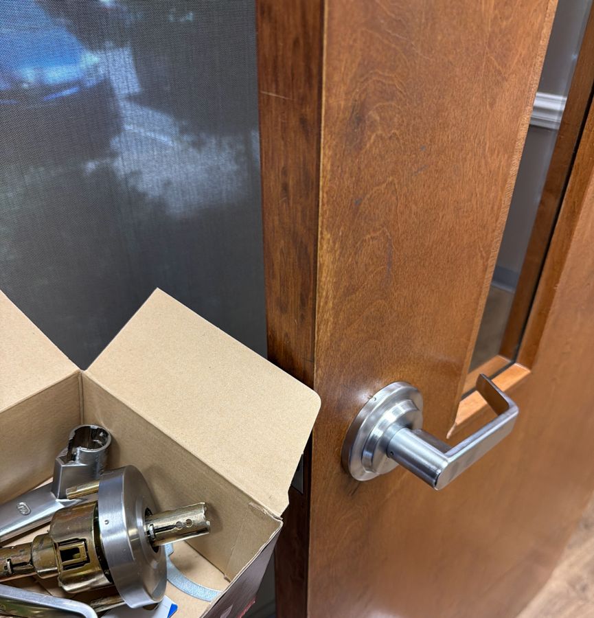 New lever lockset installed, old parts boxed up, Hickory NC