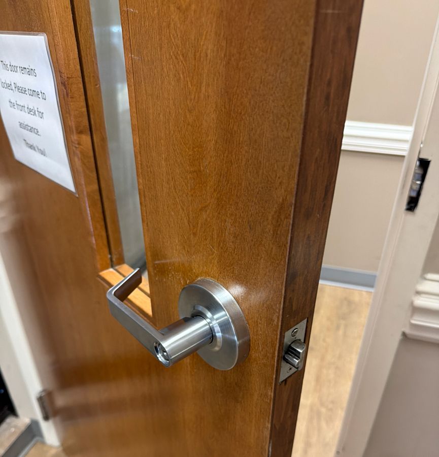 Office door lever with its cylinder missing before replacement, Hickory NC