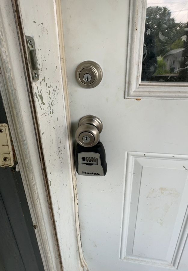Aged deadbolt and knob before replacement, Gastonia NC