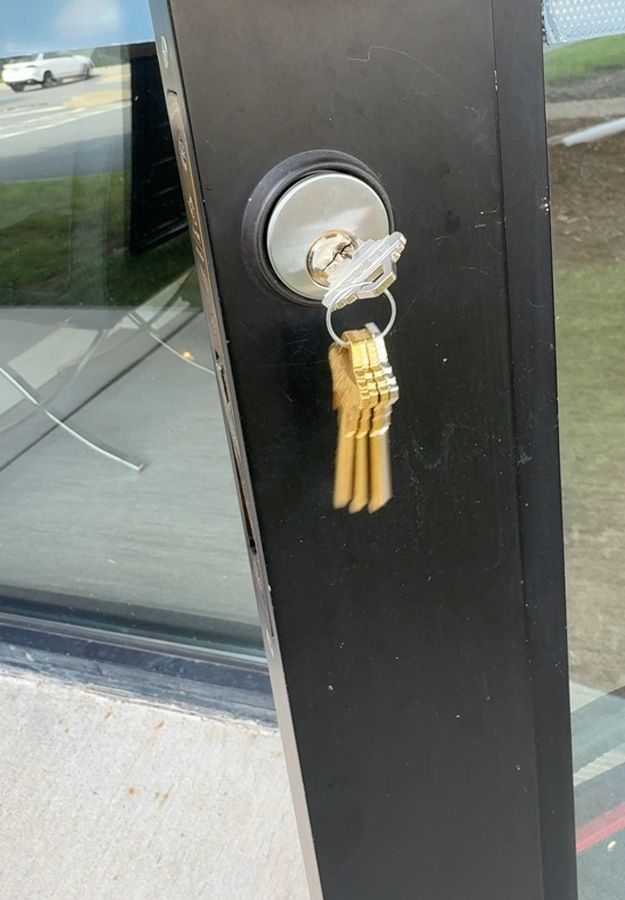 New deadbolt with fresh keys on a Charlotte storefront door